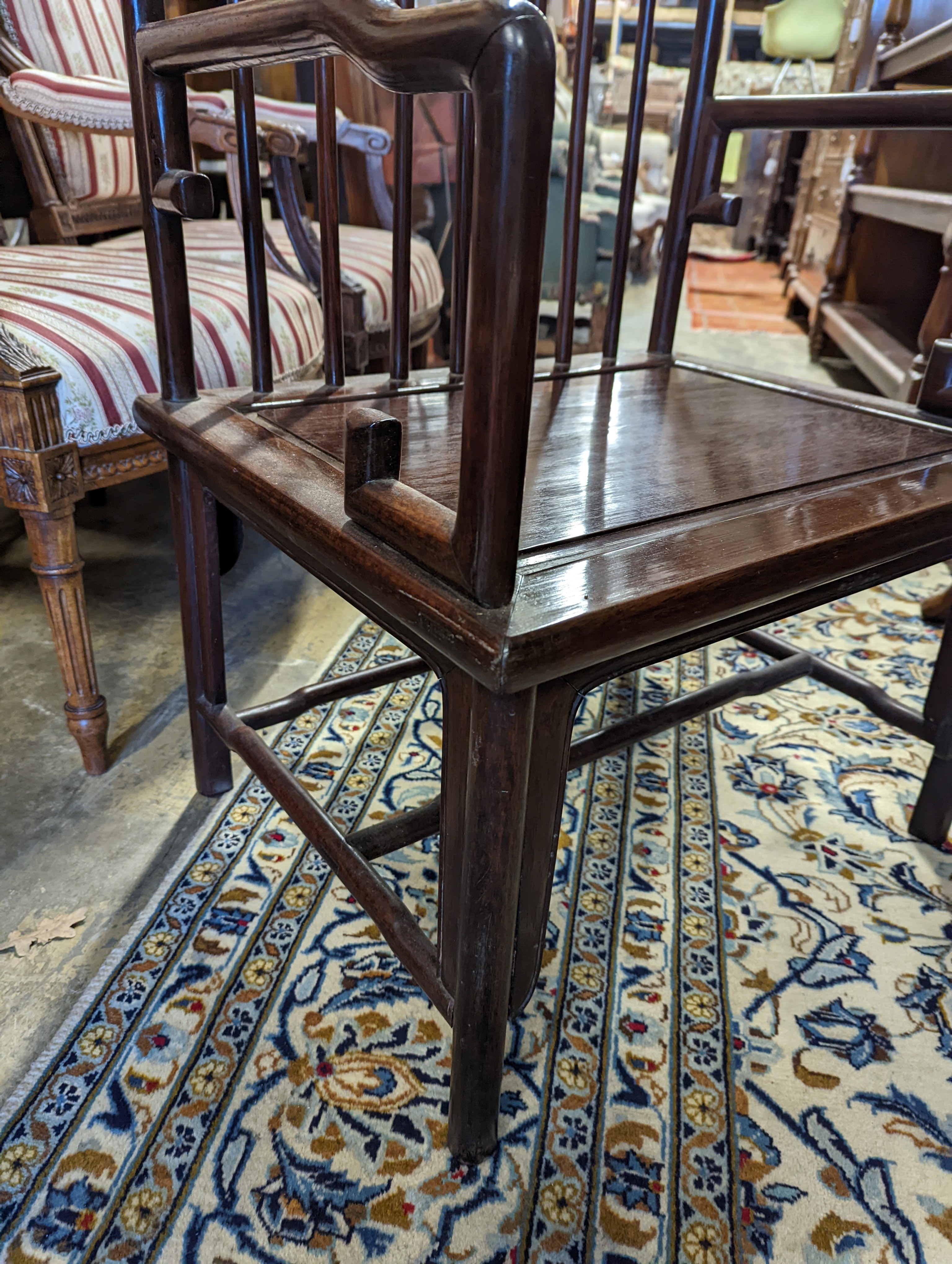 A pair of mid 20th century Chinese Hongmu elbow chairs with cushion seats, width 58cm, depth 49cm, height 92cm